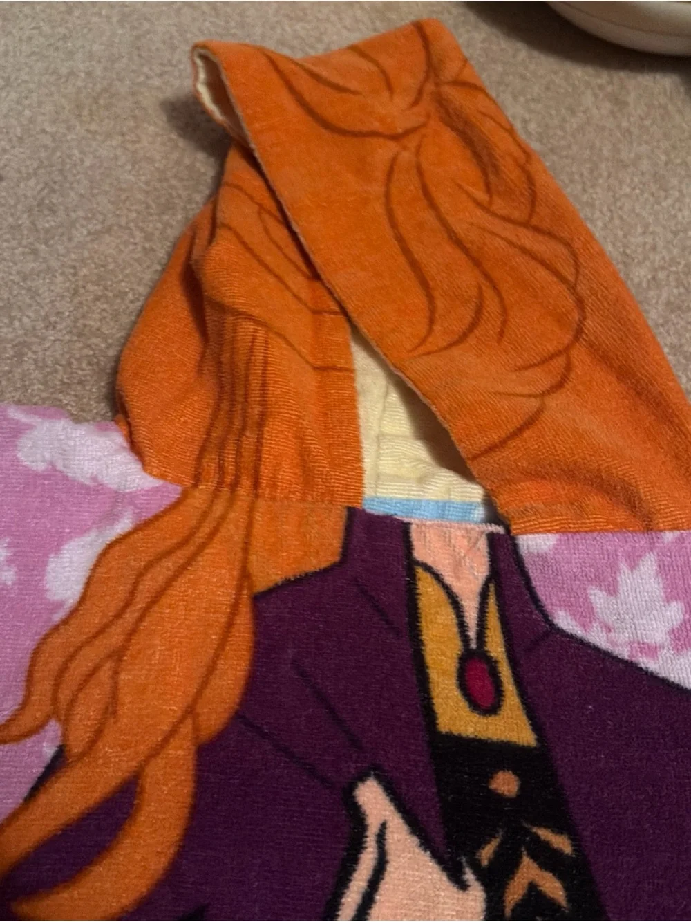 This Disney Frozen Reversible Elsa & Anna hooded poncho towel